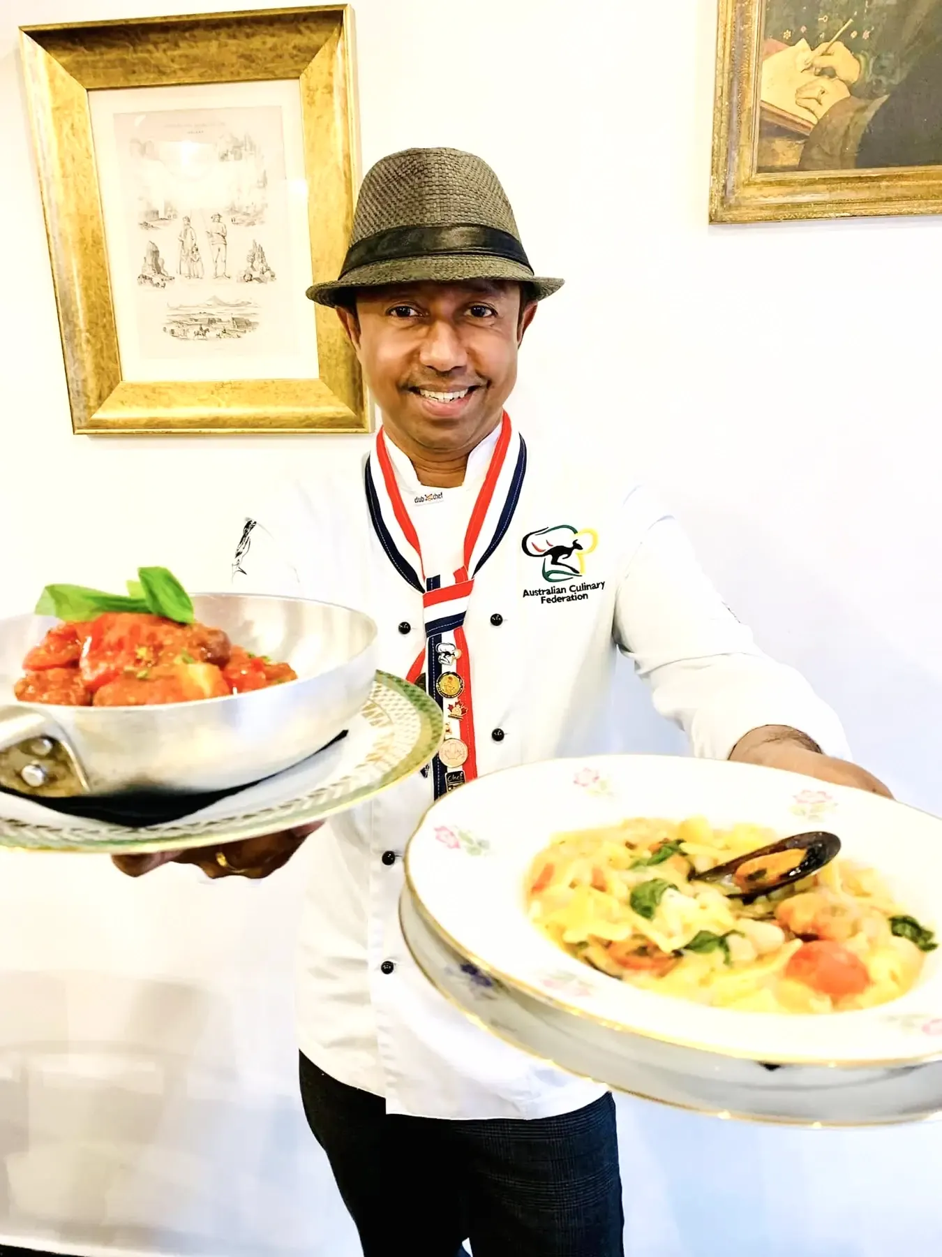 Don Sherman presenting plated dishes as an Australian Culinary Federation chef