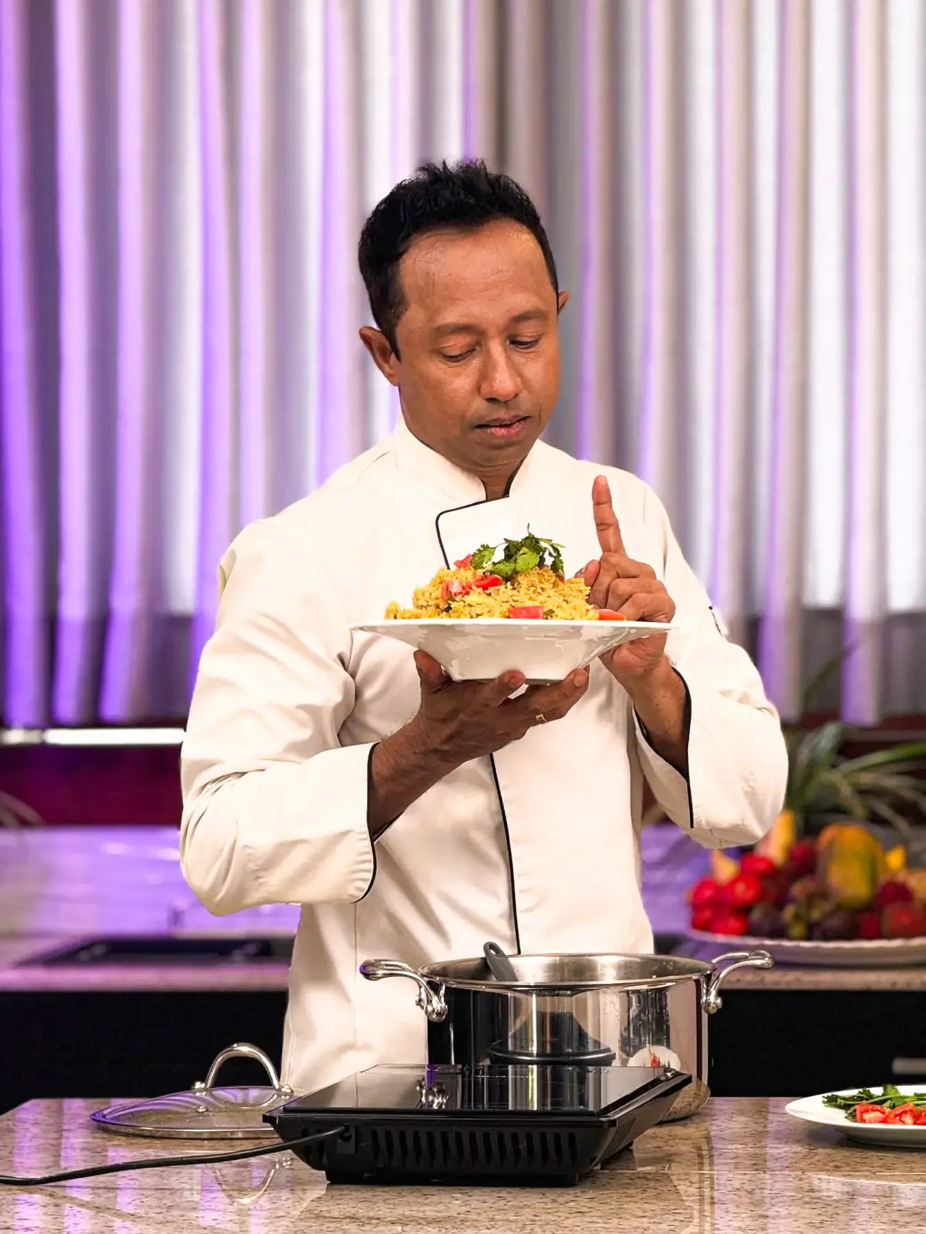 Don Sherman presenting a finished dish